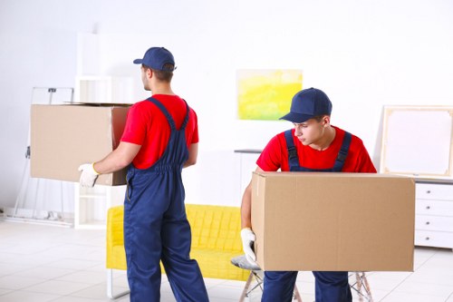 Removalists planning a home move in Westminster on a busy central London street