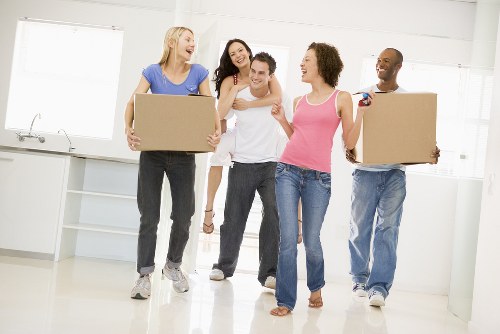 Organised packing materials and labelled moving boxes