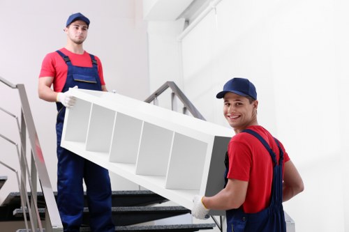 Removal team preparing a move in a Westminster residential street