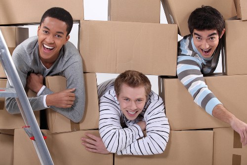 Furniture moving through a Westminster apartment building entrance