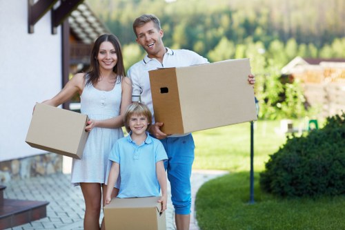 Loading household furniture into a removal van