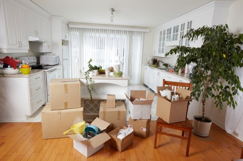 Staff assessing lifting risks during a property relocation
