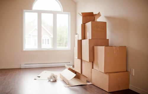 Removal team loading furniture from a Westminster property with narrow access