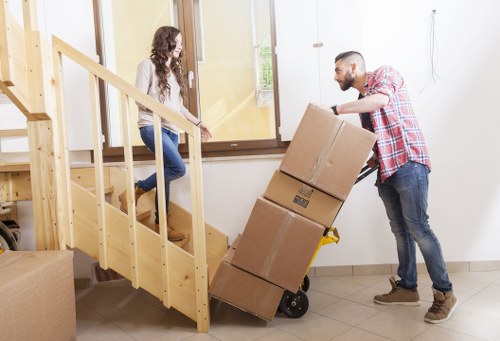 Loading office furniture carefully during a Westminster commercial relocation