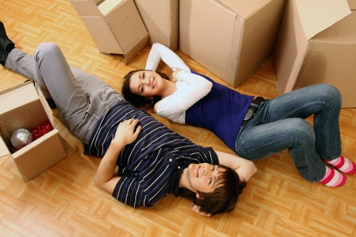 Boxes and furniture arranged for a local home or office move in Westminster